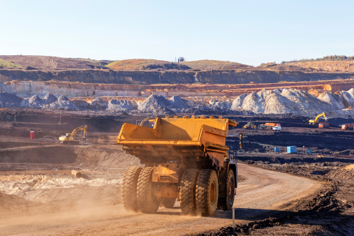 opencoal  mining pit with heavy machinery