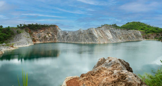 Abandoned mine - damaged landscape after ore mining. Abandoned mine - damaged landscape after ore mining.