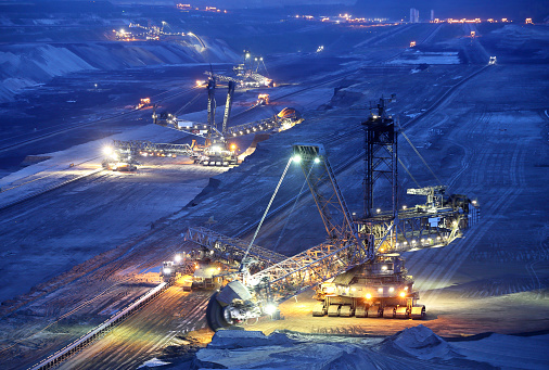 Large bucket wheel excavator in a lignite (brown-coal) mine, Germany Large bucket wheel excavator in a lignite (brown-coal) mine, Germany