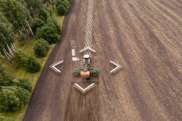 Autonomous tractor working on the field. Smart farming concept